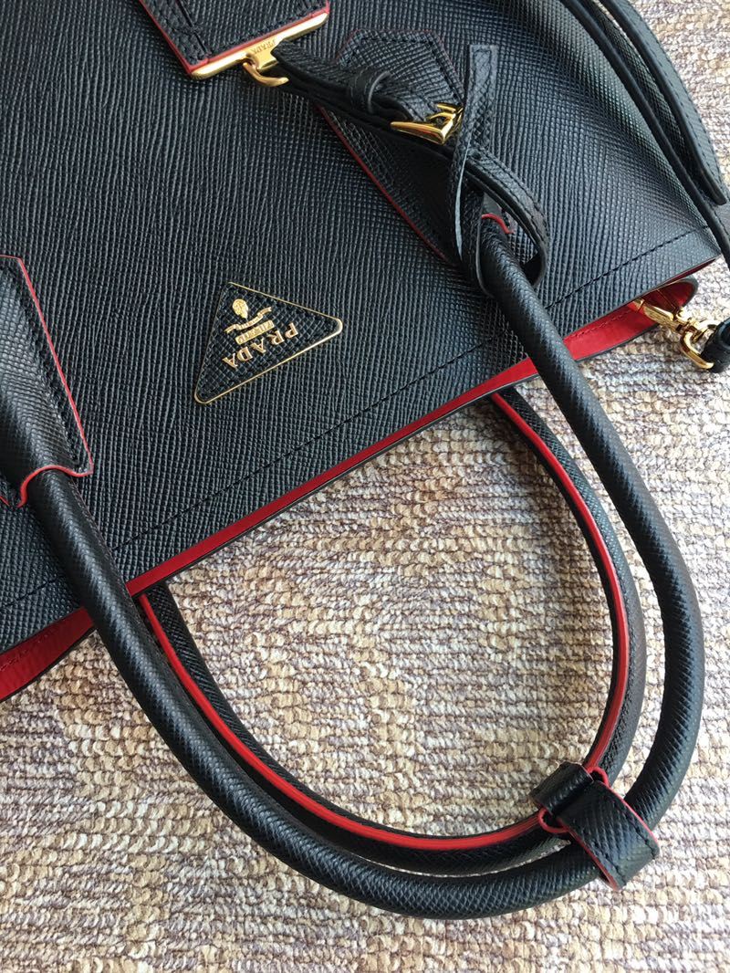 Pra*a top handle bags